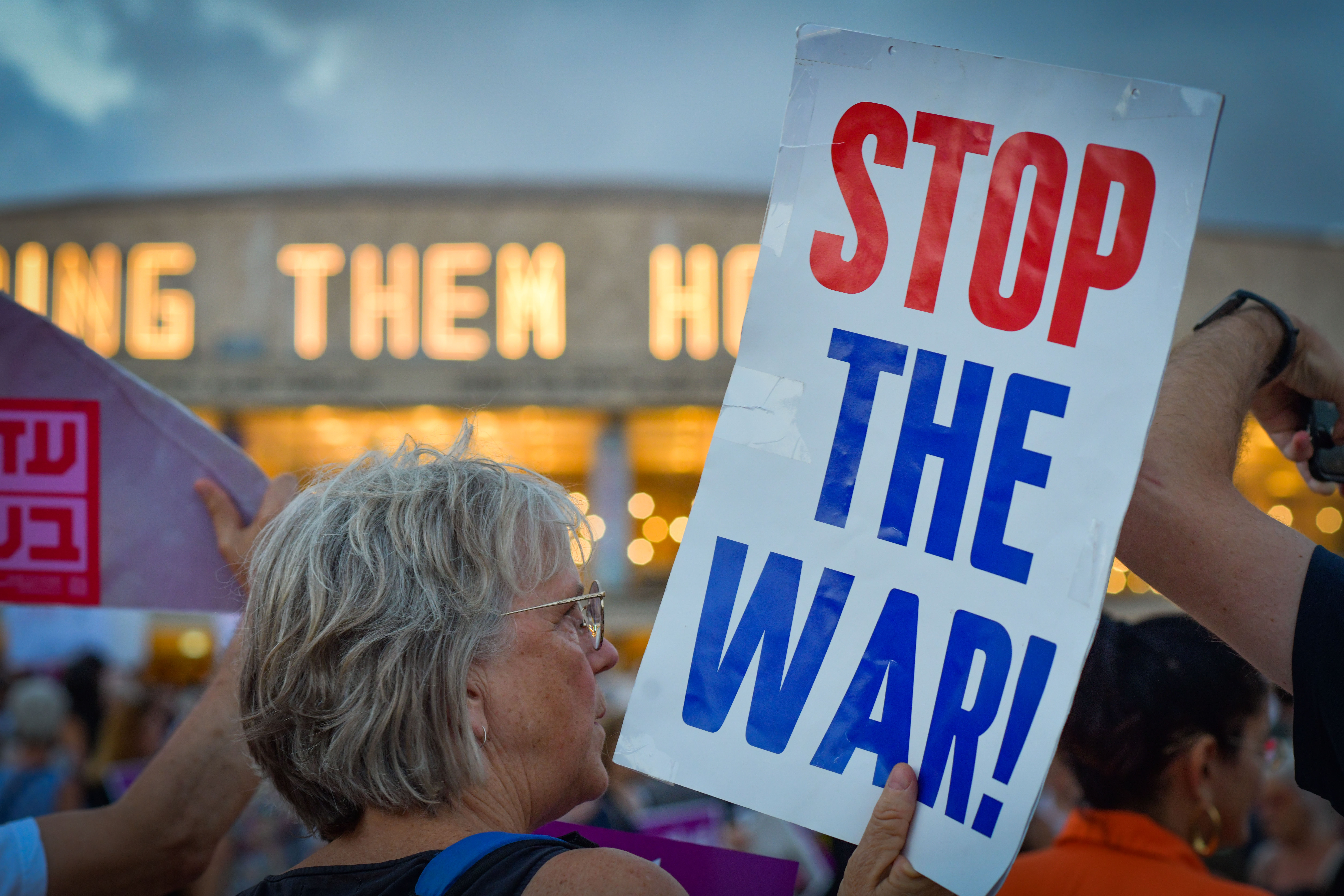 Demonstrators take part in a rally against the war in Gaza and the government at HaBima Square in Tel Aviv on July 31, 2025.